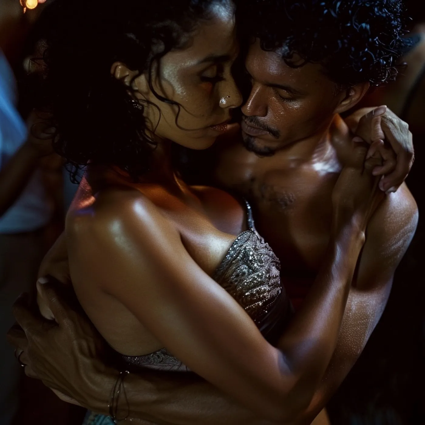 A couple in a close kizomba-style embrace